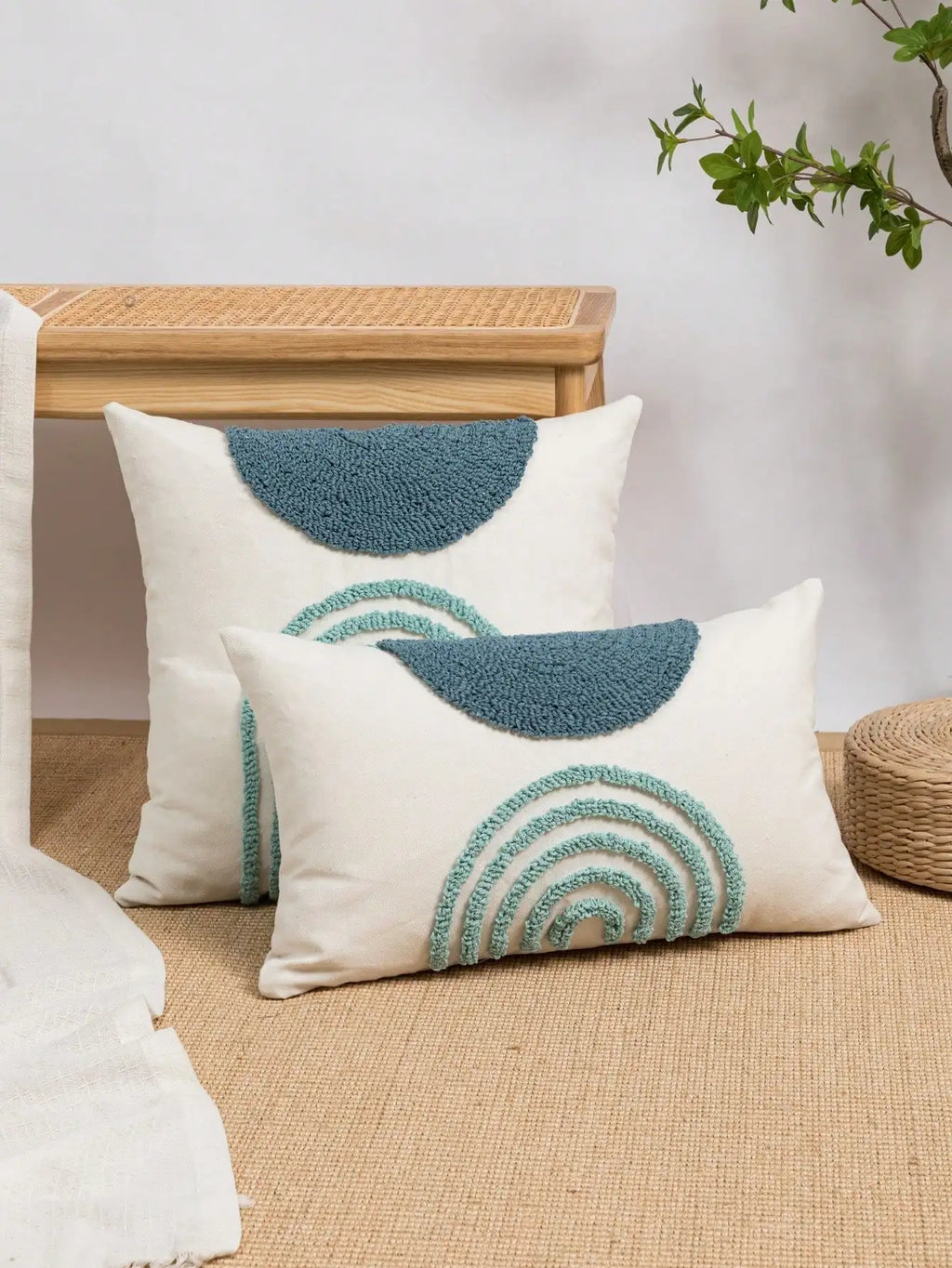 Throw pillow cover with semicircular geometric patterns.