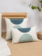 Throw pillow cover with semicircular geometric patterns.