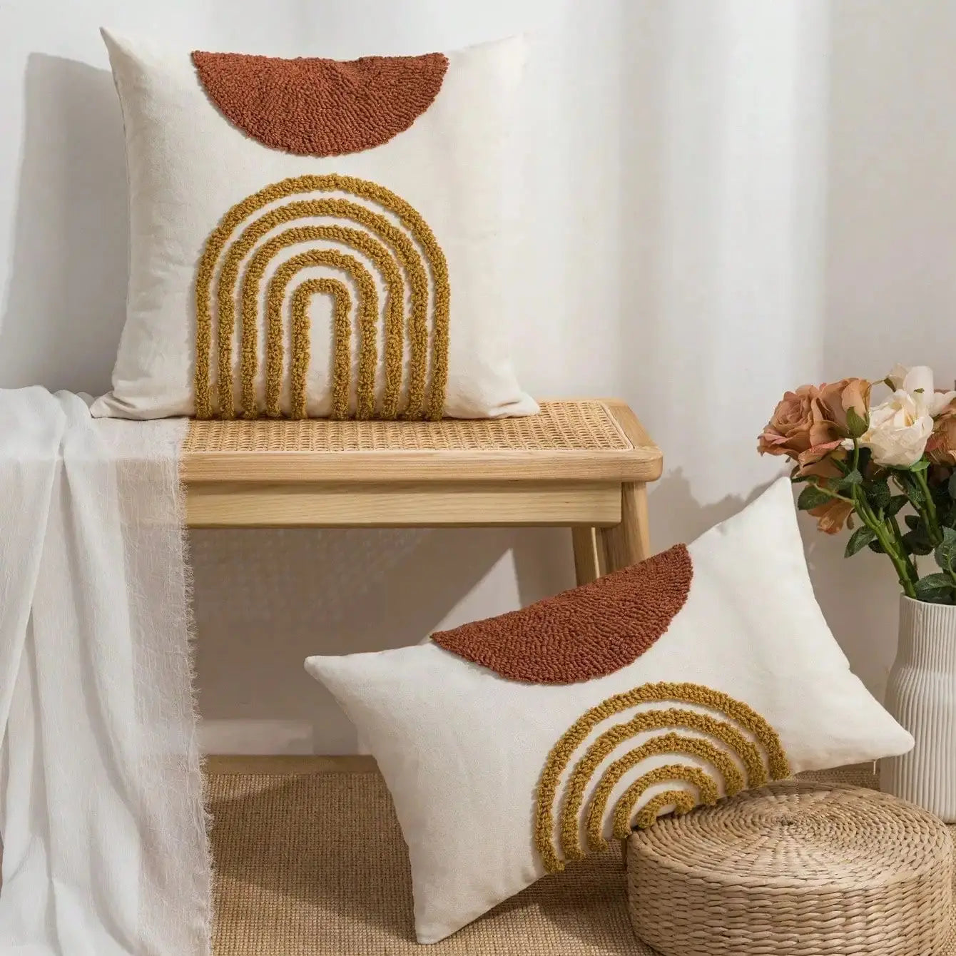 Throw pillow cover with semicircular geometric patterns.