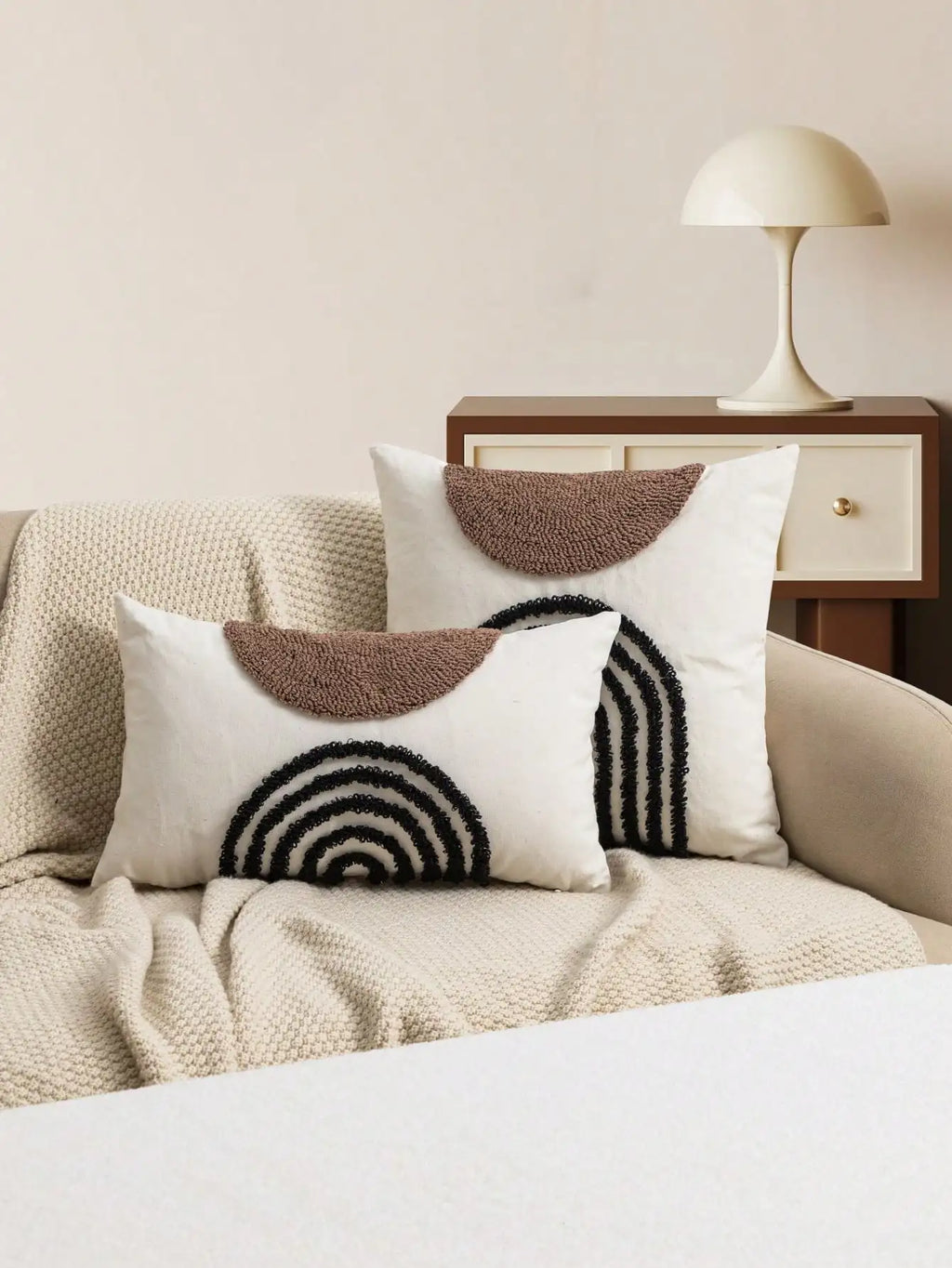 Throw pillow cover with semicircular geometric patterns.