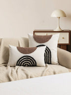 Throw pillow cover with semicircular geometric patterns.