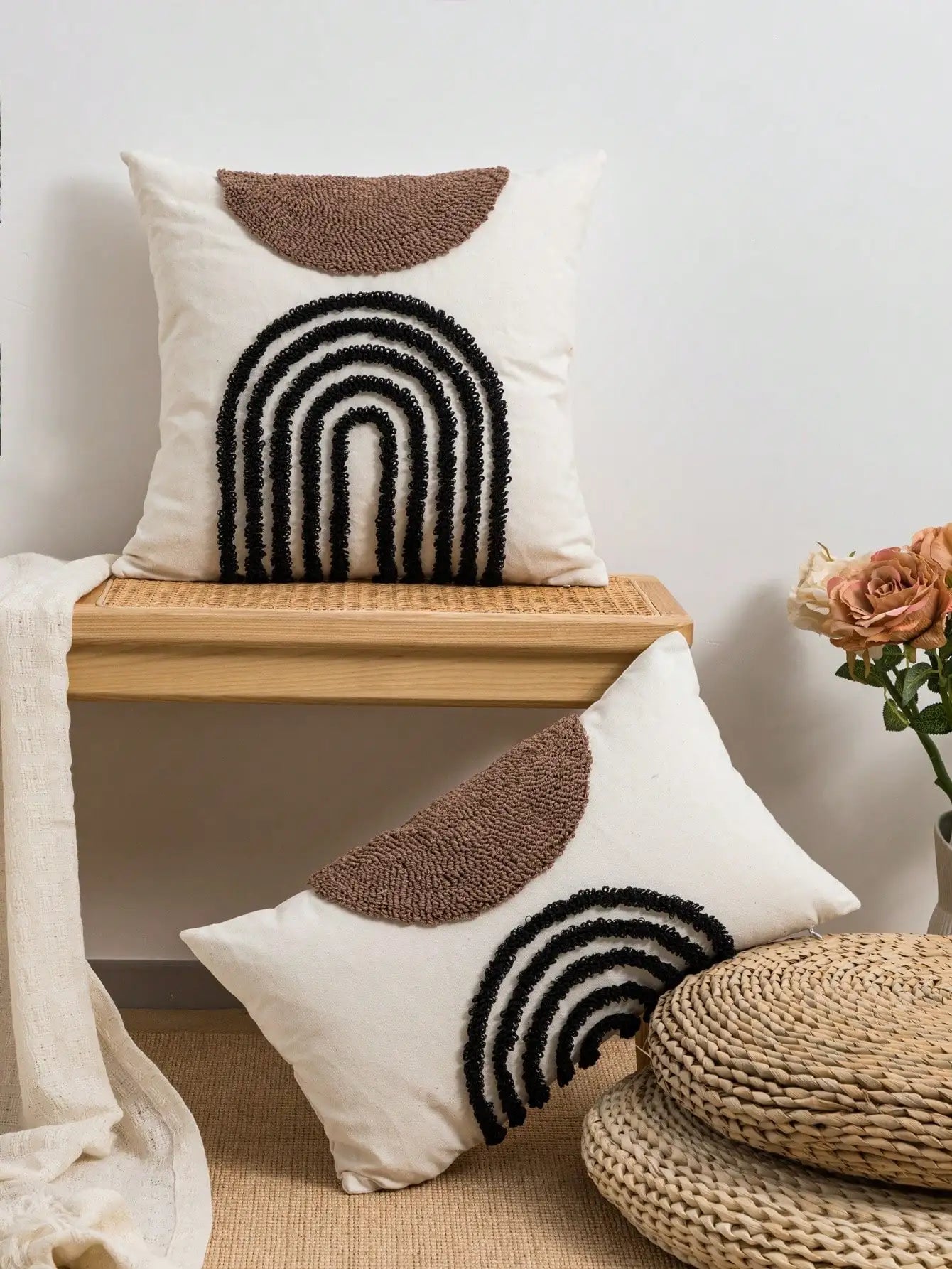 Throw pillow cover with semicircular geometric patterns.
