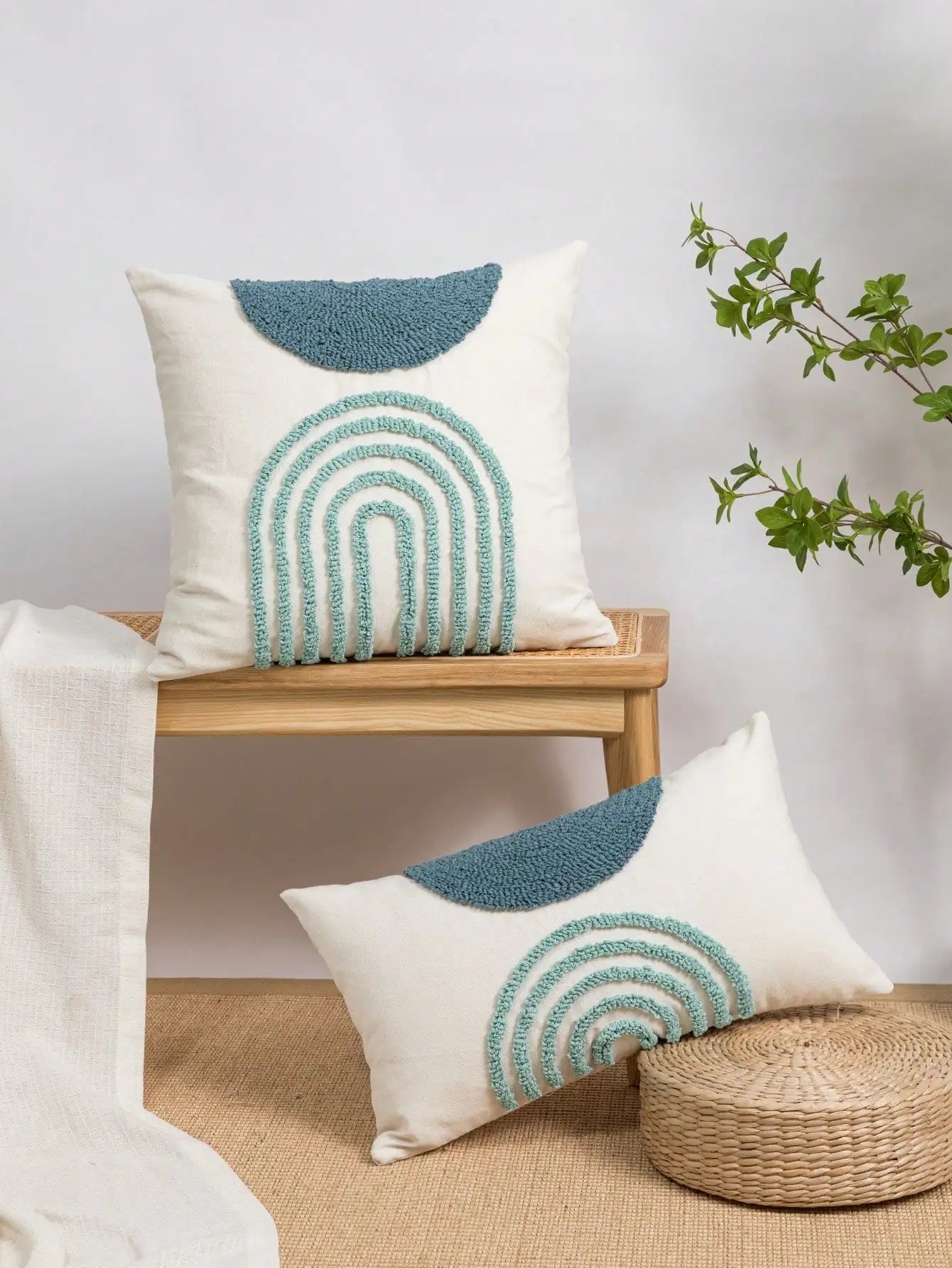 Throw pillow cover with semicircular geometric patterns.