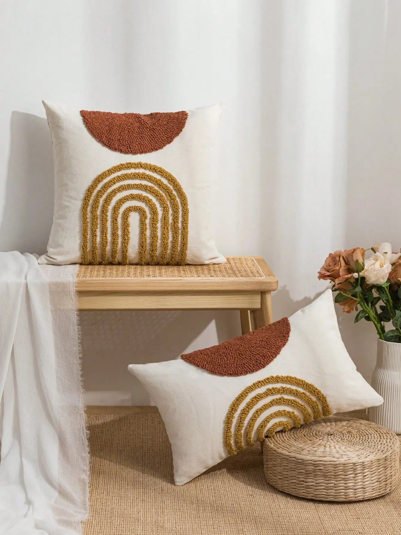 Throw pillow cover with semicircular geometric patterns.