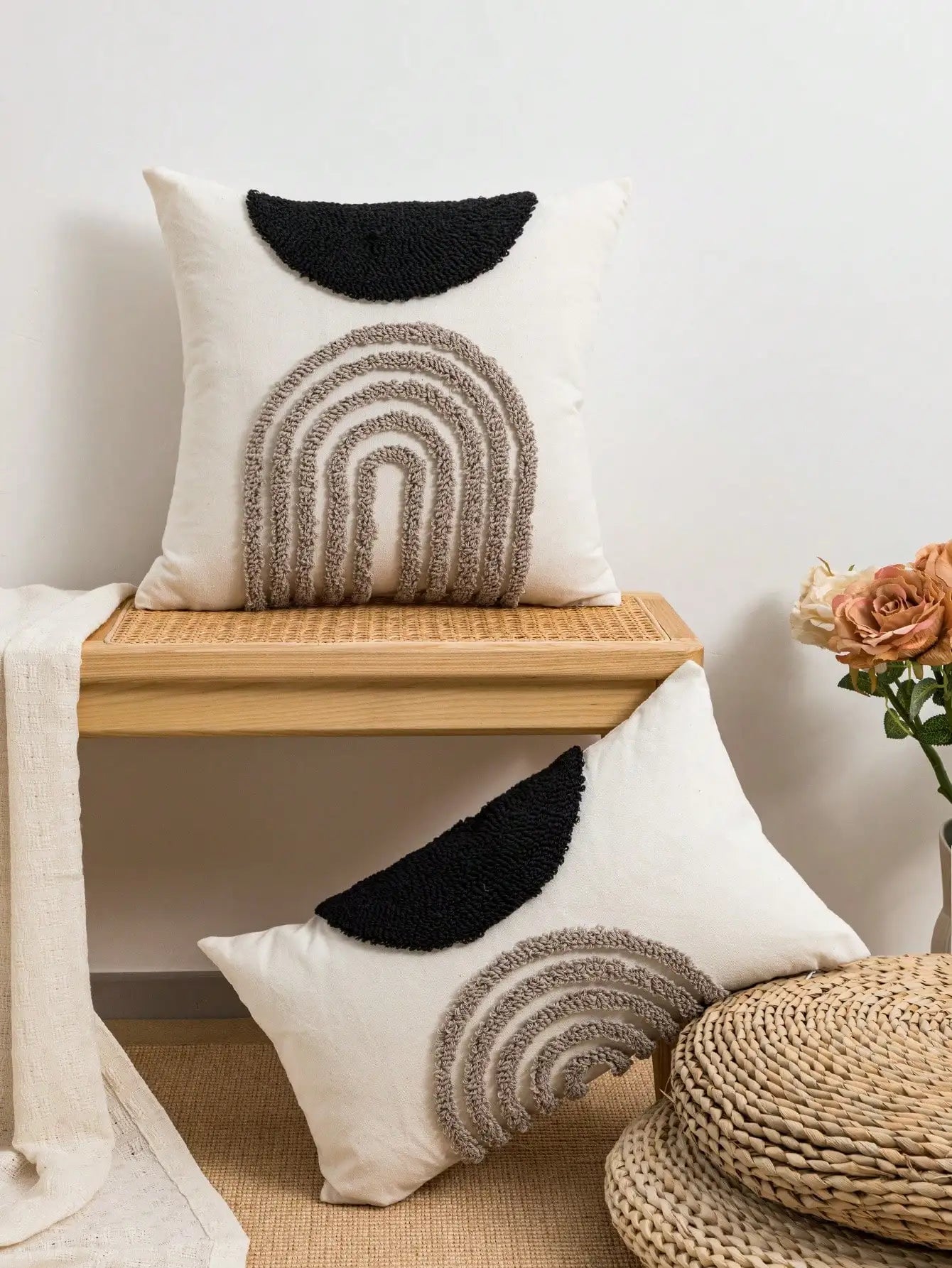 Throw pillow cover with semicircular geometric patterns.